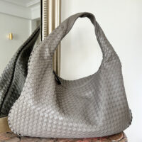 This large shoulder hobo bag features a practical zipper for keeping your essentials safe while you dance the day away. Ideal for a birthday celebration or Mothers Day gift. designer dupe vegan leather purse in dumpling woven style pattybofficial jodie bottega veneta dupe knoten tasche