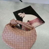 Let your accessories do the talking. The Blush Muse Woven Bag is your soft power move – a statement of elegance for the modern woman who knows that luxury is in the details. Designed in a dreamy baby pink hue, this minimalist woven handbag is the kind of piece that elevates an outfit without trying too hard. Its structured silhouette and buttery-soft, vegan-friendly material deliver that high-end, designer-inspired look – without the guilt or the price tag.